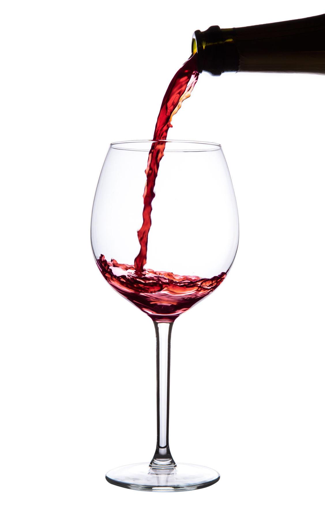 Red wine pouring into wine glass. Pinot noir. Isolated.